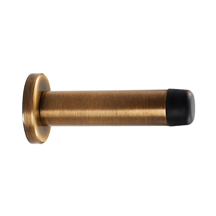 Carlisle Brass Cylinder Pattern Door Stop on Rose